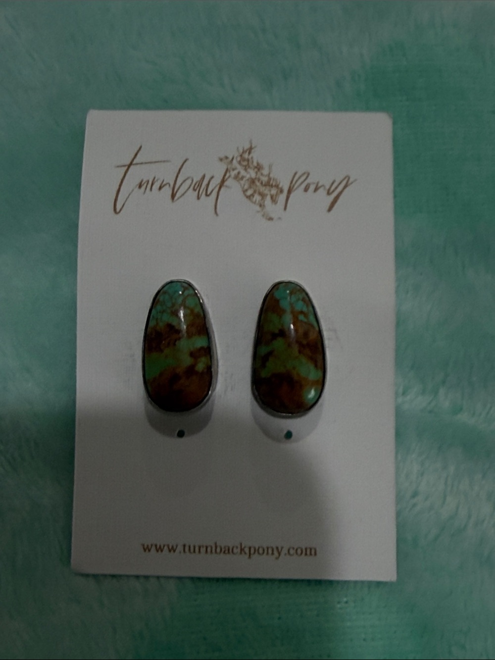 Turnback pony sterling silver studs